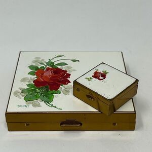 Vintage hand painted cigarette holder and small matching pill box.